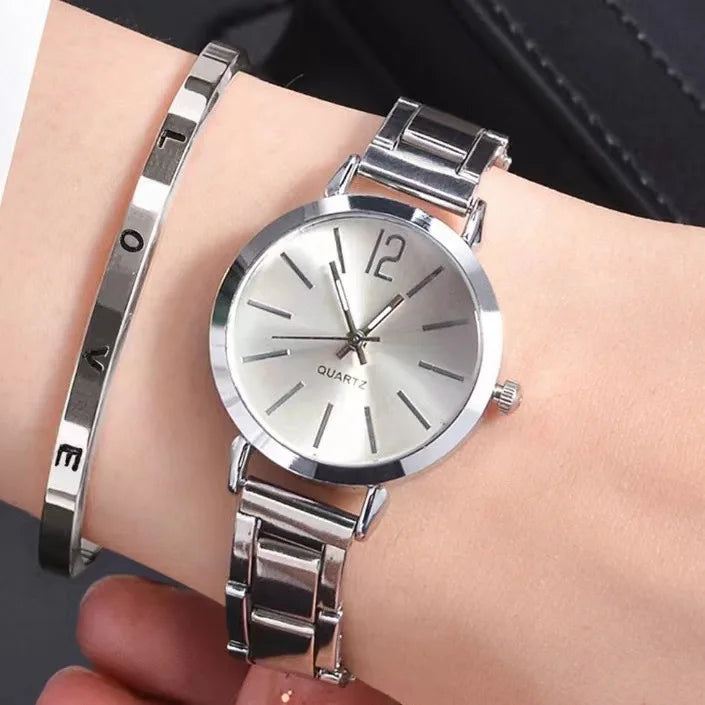 ✨ 2PCS Luxury Women's Watch Set – Elegance Meets Simplicity ✨

Add a touch of timeless charm to your look with this 2-piece luxury women’s watch set, featuring a sleek simple dial and a stylish hollow gold bracelet st