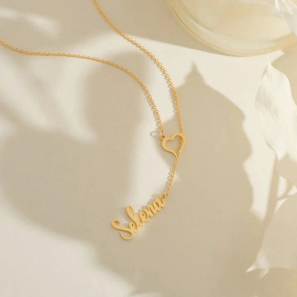 ✨ Personalized Name Necklace with Heart Clasp – Elegant Women’s Jewelry ✨
Add a touch of elegance and meaning to your style with this custom name necklace featuring a unique heart-shaped clasp. Crafted from premium st