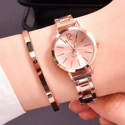 ✨ 2PCS Luxury Women's Watch Set – Elegance Meets Simplicity ✨

Add a touch of timeless charm to your look with this 2-piece luxury women’s watch set, featuring a sleek simple dial and a stylish hollow gold bracelet st